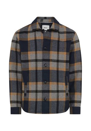 Button-up long-sleeve plaid shirt jacket with navy, gray, black, and mustard yellow checkered pattern and a chest pocket.