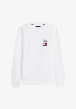 Felpa bianca in misto cotone, con piccolo logo Tommy Hilfiger ricamato e accento color-block sotto. Maniche lunghe, scollo rotondo.