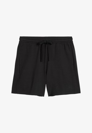 Zwarte casual shorts met een elastische tailleband, trekkoord en zijzakken, plat uitgespreid op een witte achtergrond.