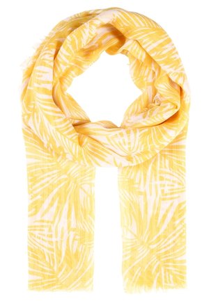 Écharpe jaune avec motif de feuilles tropicales blanches, tissu léger, pliée de manière lâche avec des bords effilochés.