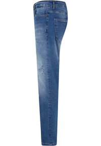 Jeans ajustados de denim azul con un lavado desvaído y acentos desgastados. Presentan un clásico diseño de cinco bolsillos y pasadores para cinturón.