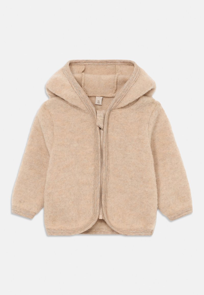 Cárdigan con capucha beige claro, hecho de material suave, con cierre de cremallera en la parte delantera, dobladillo redondeado y puños acanalados.