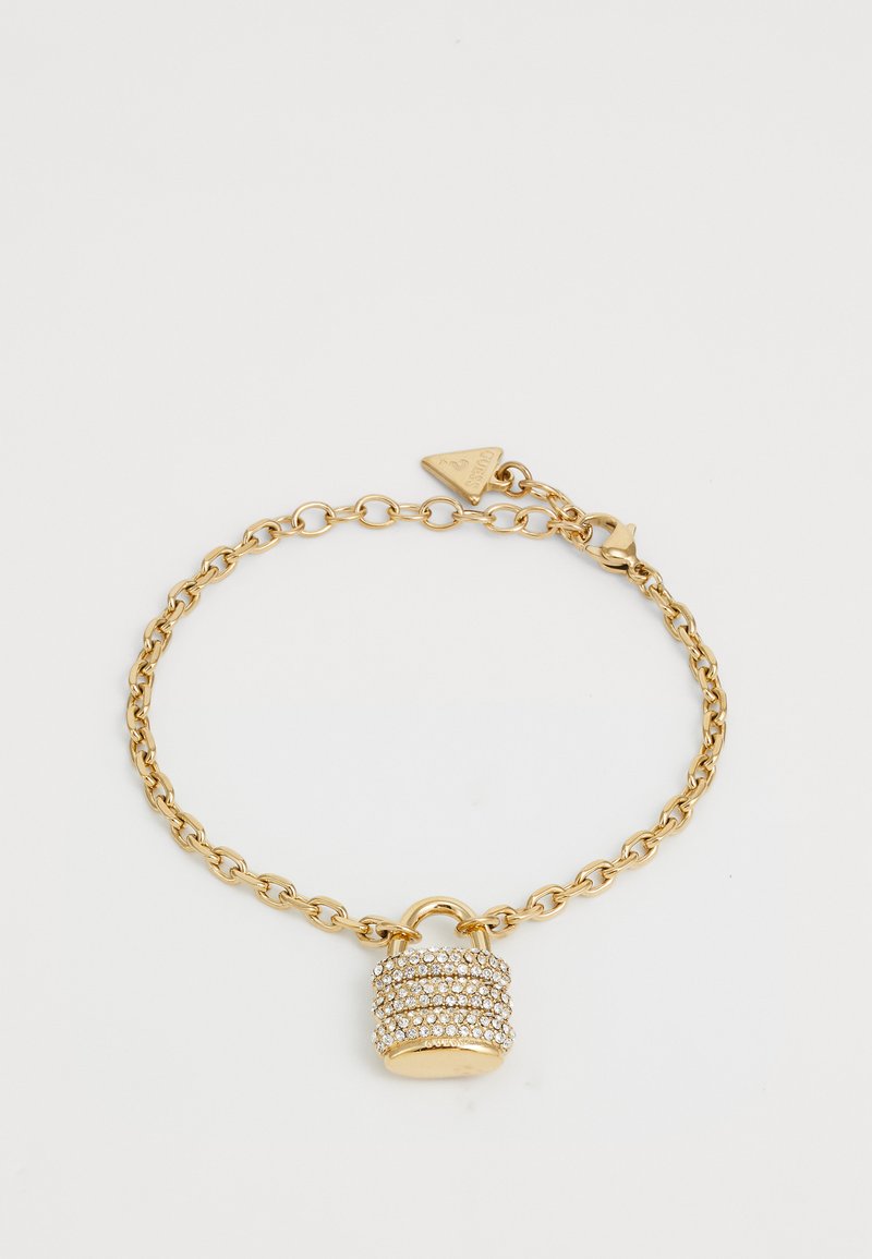 Gold chain bracelet featuring a padlock charm adorned with sparkling rhinestones. The padlock has a cylindrical shape and textured surface.
