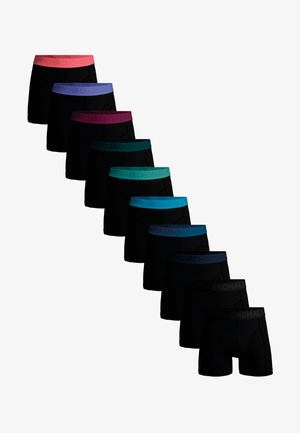 Desať čiernych boxeriek s pásmi v rôznych farbách, každý pás je označený značkou "MUCHACHOMALO".