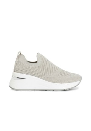 Grey knitted slip-on sneaker featuring a textured upper, white sole with a slight elevation, and a minimalist design.
