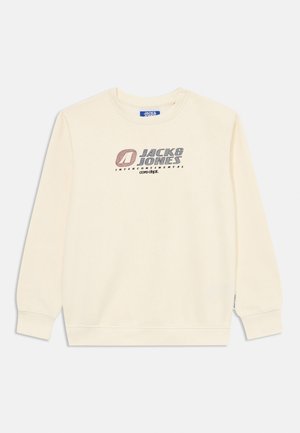 Cream sweatshirt features a round neck, long sleeves, and a textured print of "Jack & Jones" and "Intercontinental" in gray and red.