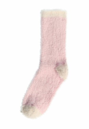 Hyggelig pink sok med en blød tekstur, der har en cremede manchet og tådetaljer, som giver varme og komfort.