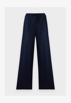 Σκούρο μπλε παντελόνι με φαρδιά μπατζάκια, διακριτική υφή ζιγκ-ζαγκ, ελαστική μέση και κλείσιμο με κορδόνι.