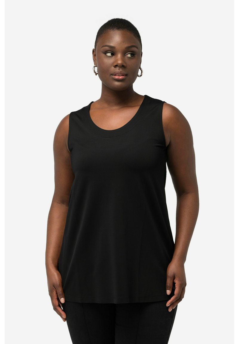 Top senza maniche nero con scollo rotondo, realizzato in tessuto morbido. Design loose-fit che arriva ai fianchi, completato da una silhouette semplice.
