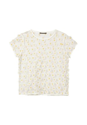 White short-sleeve crop top with a sheer overlay featuring small 3D white and yellow daisy appliques all over.