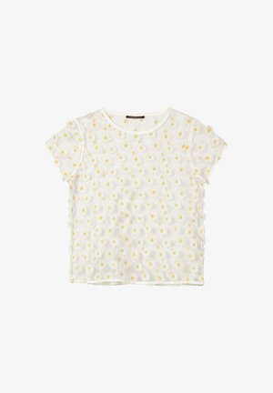 White short-sleeve crop top with a sheer overlay featuring small 3D white and yellow daisy appliques all over.