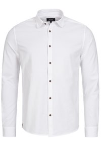 Weißes Langarmhemd aus Baumwolle mit einem Button-Down-Kragen, einer Vorderleiste mit braunen Knöpfen und einem abgerundeten Saum.