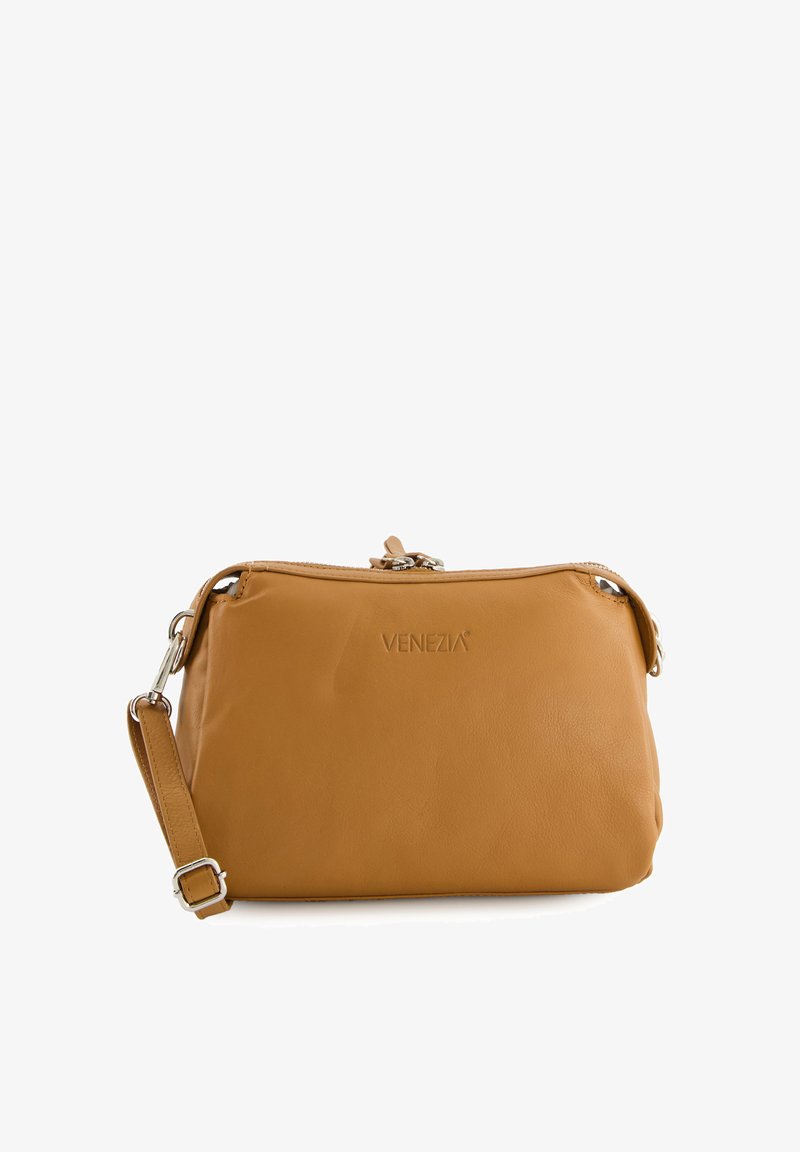 Tan leather crossbody bag with a zip closure, silver hardware, and a single adjustable strap. Features embossed "VENEZIA" logo.