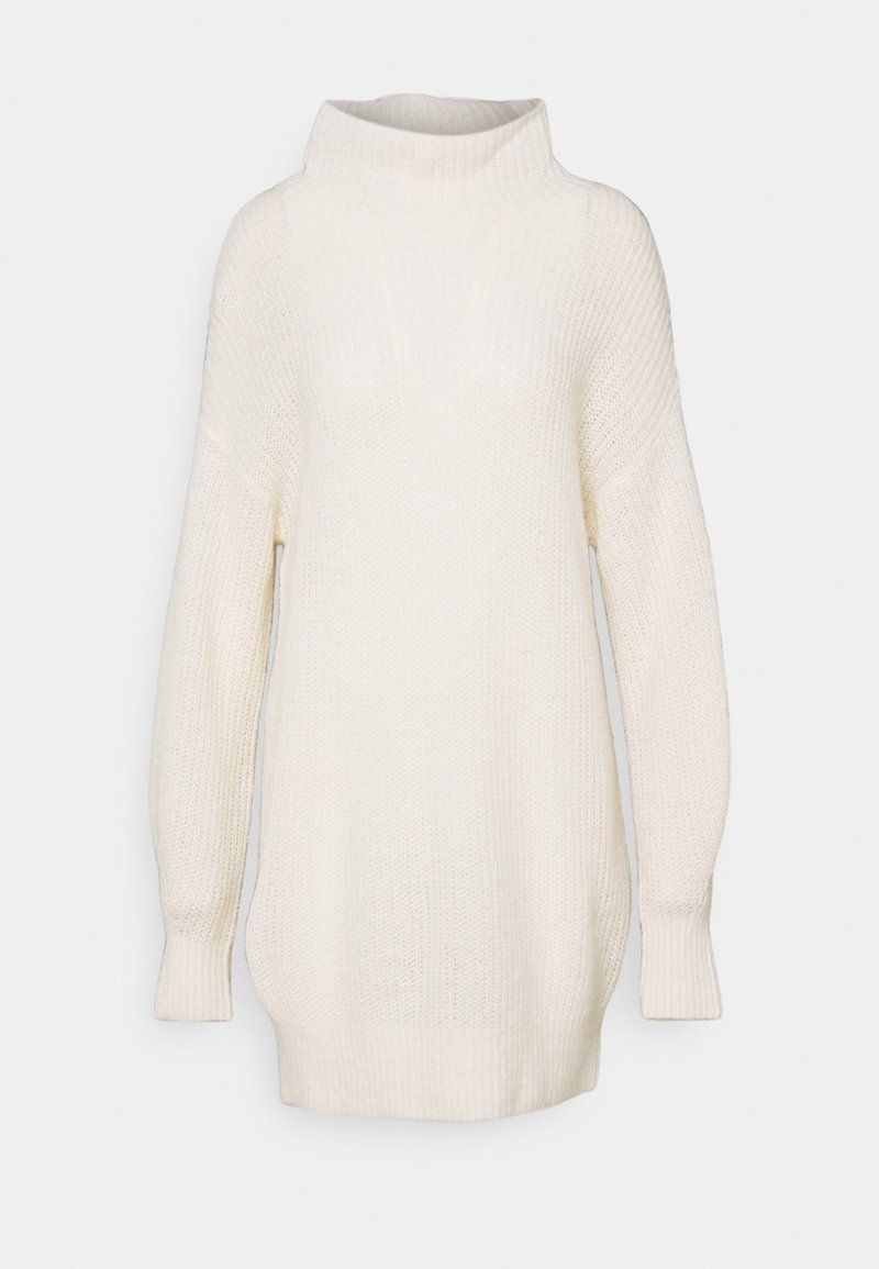 Pull-over en maille crème surdimensionné avec un col montant, des manches longues, une texture côtelée et une coupe décontractée, conçu pour le confort.