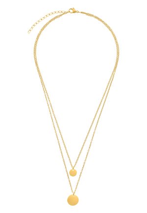 Collier en couches doré avec deux pendentifs ronds, l'un plus grand et l'autre plus petit, sur des chaînes fines et délicates.