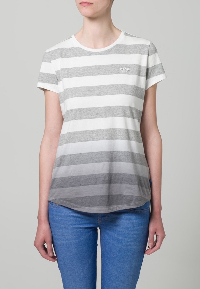 Grå- och vitrandig kortärmad T-shirt i mjuk bomull, med rundad hals och diskret logotyp på bröstet.