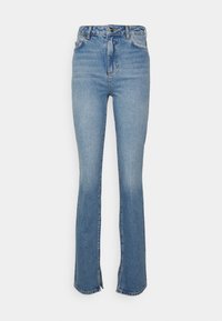 Calças de ganga flare em azul, com um waist alto, fecho à frente por botão e pequenas desgastes no tecido, apresentando fendas laterais na barra.