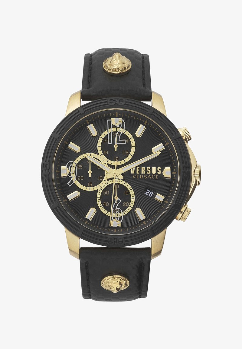 Guldfärgad kronografklocka med ett svart texturerat armband, utrustad med en svart urtavla, vita timmarkörer och en distinkt lejonhuvudaccent på armbandet.