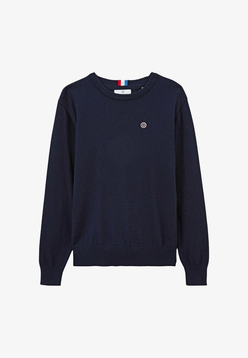 Pull marine bleu à manches longues, avec un ourlet et des poignets côtelés, un col rond et un petit logo circulaire sur la poitrine. Texture en tricot douce.