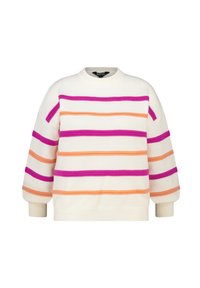 Pull crème avec des rayures horizontales violettes, orange et roses. Il présente un col rond, des épaules tombantes et des poignets côtelés. Texture douce.