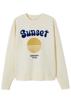 Krémová mikina s modrým nápisem "Sunset", stylizovaným žlutým sluncem a nápisem "GROOVY 1976" vytištěným pod motivem slunce.