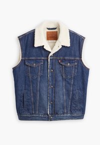 Denimvest med sherpa-krage, laget av mørkeblått stoff, med frontknapper og to brystlommer med klaffer samt sidelommer.