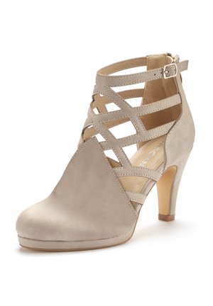 High heeled ankle boots - beige
