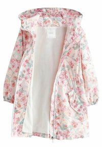 Veste imperméable fleurie avec motif rose et blanc, dotée d'une doublure intérieure, d'une fermeture éclair, d'une capuche et de poignets élastiques. Une poche à l'avant.