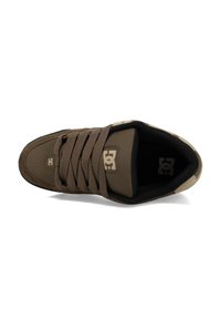 Brown sneaker with a perforated synthetic upper, flat dark brown laces, padded tongue, and contrasting light brown accents on the sole.