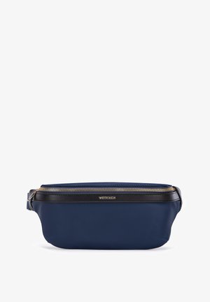 Námořnická modrá taška z hladké syntetické kůže s černým koženým akcentem. Obsahuje zlatý zip a detail loga na přední straně. Kompaktní design.