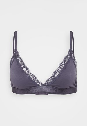 Bezvadu krūšturis tumši pelēkā audumā ar mežģīņu apdari gar malām, regulējamām siksnām un platu joslu zem krūtīm atbalstam.