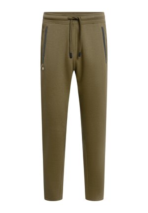 Olivgrüne, schmal zulaufende Jogginghosen mit Kordelzugbund und seitlichen Reißverschlusstaschen, die dunkle Paspeln und eine kleine Knopfverzierung aufweisen.