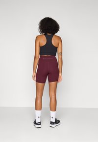 Champion SOFT TOUCH BIKER PANTS - Tajice - bordeuax
