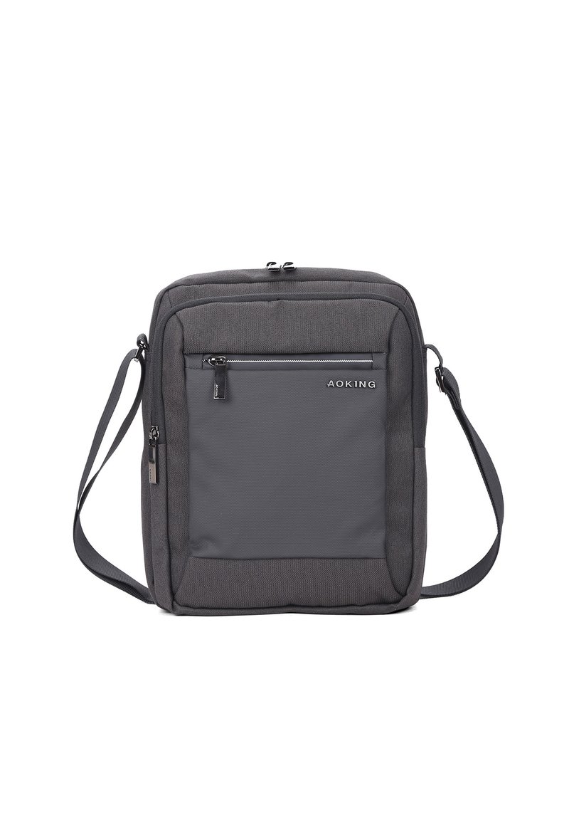 Borsa a spalla grigia, rettangolare, con un compartimento principale dotato di una zip nera, tasca frontale con zip e tracolla regolabile. Tessuto testurizzato.