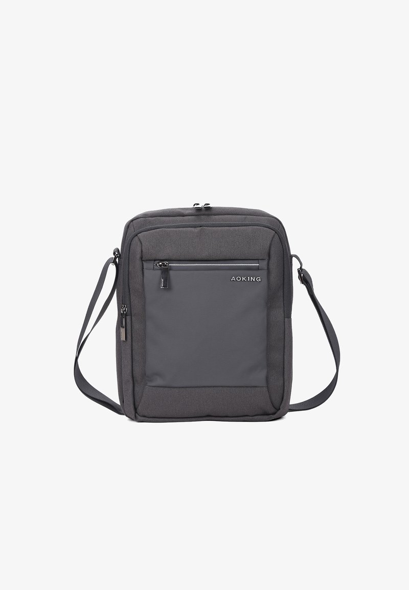 Borsa a spalla grigia, rettangolare, con un compartimento principale dotato di una zip nera, tasca frontale con zip e tracolla regolabile. Tessuto testurizzato.