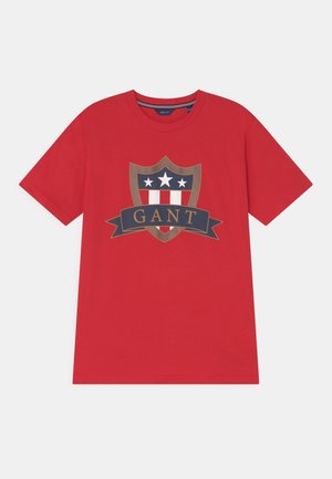 BANNER SHIELD - T-shirt med print - bright red