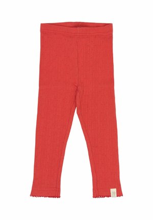 Piros bordás leggings, puha anyagból készült. Scallop aljzattal és kis kivágásos mintákkal díszített. A címkén "PP" márkanevével.