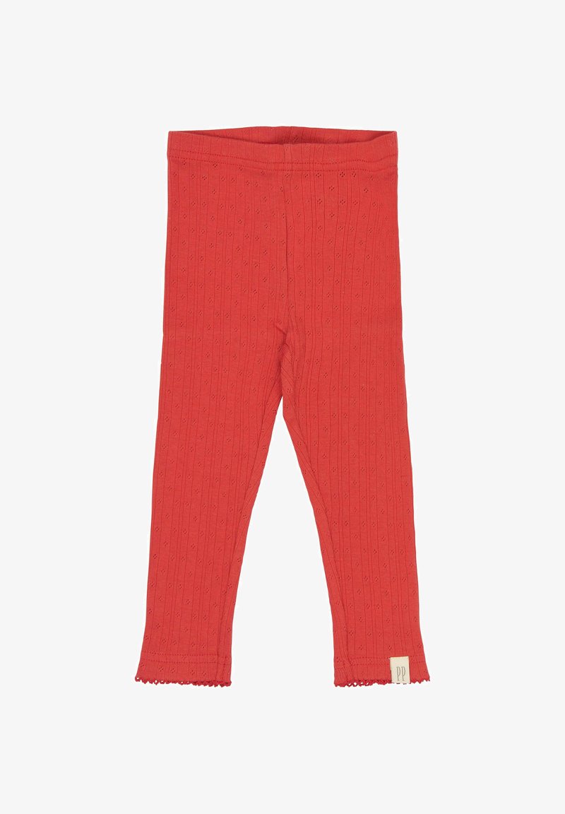Piros bordás leggings, puha anyagból készült. Scallop aljzattal és kis kivágásos mintákkal díszített. A címkén "PP" márkanevével.