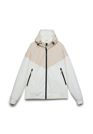 Giacca leggera con design a blocchi di colore beige e bianco, caratterizzata da cappuccio, tasche con cerniera e una texture liscia e opaca.