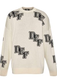 Cremfarbener Strickpullover mit schwarzen "DEF"-Logo-Mustern. Ribbelkragen und -bündchen. Lockere Passform mit weichem Textilgefühl.