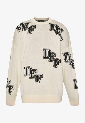 Kremowy sweter dziewiarski z wzorem logo "DEF" w czerni. Żebrowany dekolt i mankiety. Luźny krój o miękkiej teksturze.