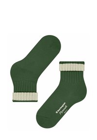 Zielone skarpetki z prążkowanym kremowym mankietem, charakteryzujące się gładką strukturą i wzmocnionym palcem. Widoczna bielizna z logotypem.