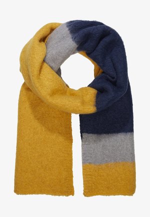 Écharpe en tricot doux avec blocs de couleur jaune moutarde, bleu marine et gris clair, bouclée de manière lâche.