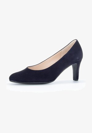 Navy suede high heels with a pointed toe, 3-inch heel, smooth inner lining, and a slight curve along the top edge.