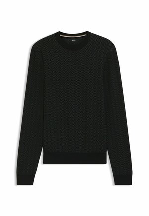 Pull noir avec un motif en chevrons, col rond côtelé et bords-côtes. Fabriqué en tissu doux, il présente une bande contrastante au niveau du col.