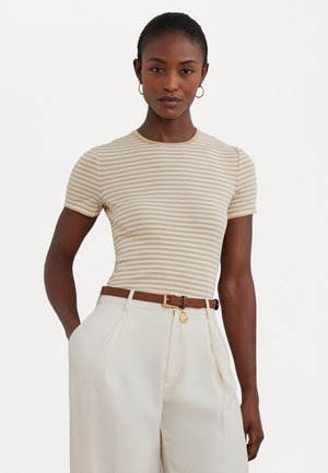 Striped beige t-shirt with short sleeves, rounded neckline, paired with high-waisted, cream trousers and a brown belt featuring a gold buckle.