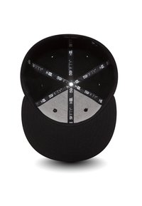Black fabric cap with curved brim. Inside is gray with black labels. Features ventilation eyelets along the crown for airflow.