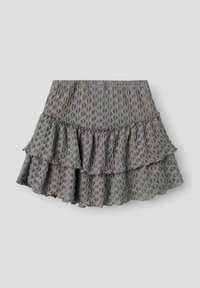 Jupe grise à volants avec un tissu texturé présentant un motif en losange. Ceinture élastique et trois couches de volants.