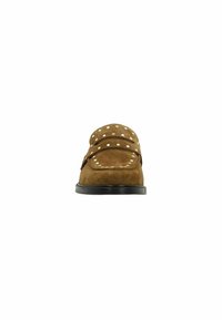 Brown suede slip-on shoe with white polka dots, flat black sole, rounded toe, and dual decorative straps across the upper.