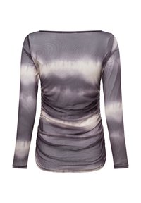 Long-sleeve top in a soft, sheer fabric featuring a gray and cream tie-dye pattern and gathered sides for added texture and shape.